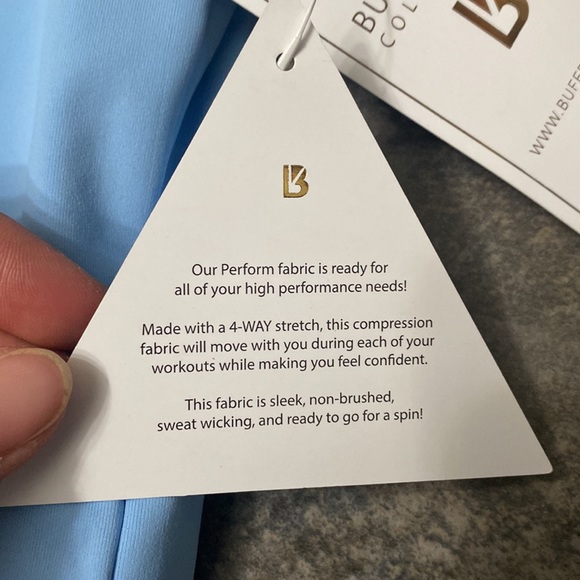 Buffbunny Asymmetrical Top - Picture 2 of 5